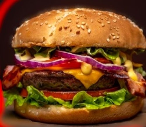 Stacked Uncle Sal's burger with lettuce, cheese, bacon, tomato and red onion