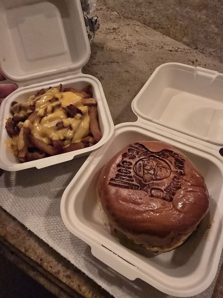 Burger and loaded cheese fries takeout